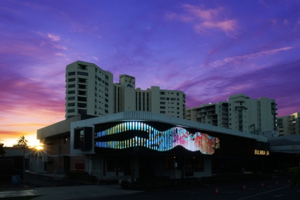 Artwork on Bulmba-ja Facade produced by the Arone Meeks Estate, Geoff Dixon and Russell Milledge as a tribute to Arone Meeks, 2021, digital animation, LED strips on building. Courtesy of Arone Meeks Estate and NorthSite Contemporary Arts.