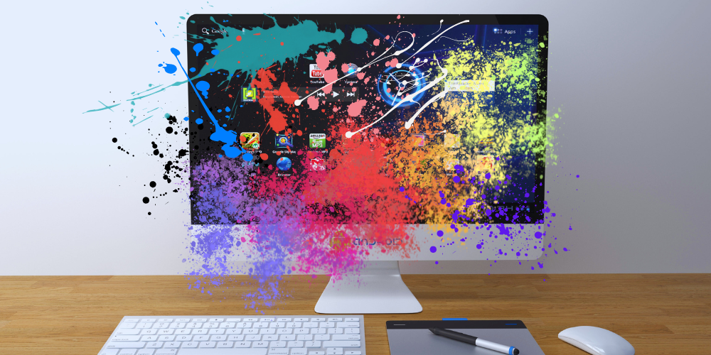 Computer with paint splashes over the screen
